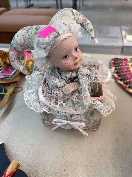 vintage porcelain jester doll and puppy figurine image