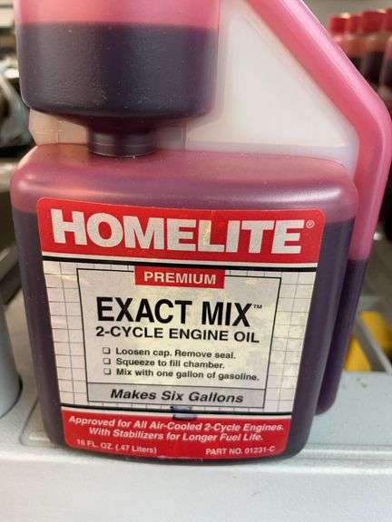 Nine bottles of home light premium exact mix two cycle engine oil. image