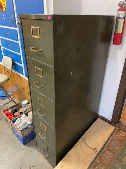 Five drawer metal file cabinet with several hanging file folders image