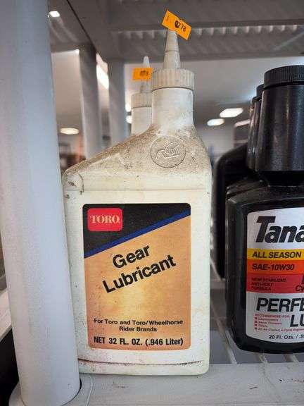 Four bottles of Toro gear lubricant. image