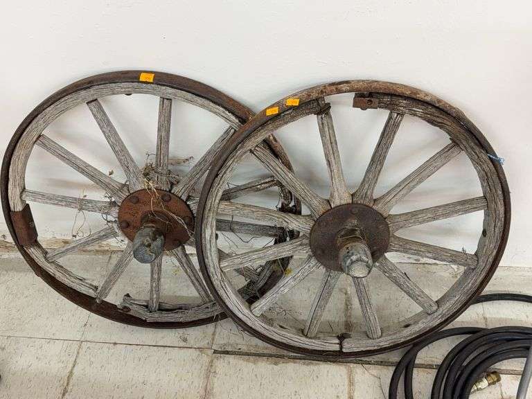 2 small wood spoke Vintage wagon wheels image