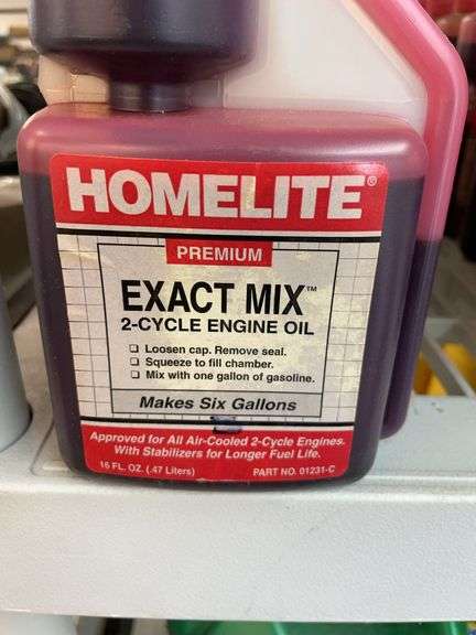 Nine bottles of home light premium exact mix two cycle engine oil. image