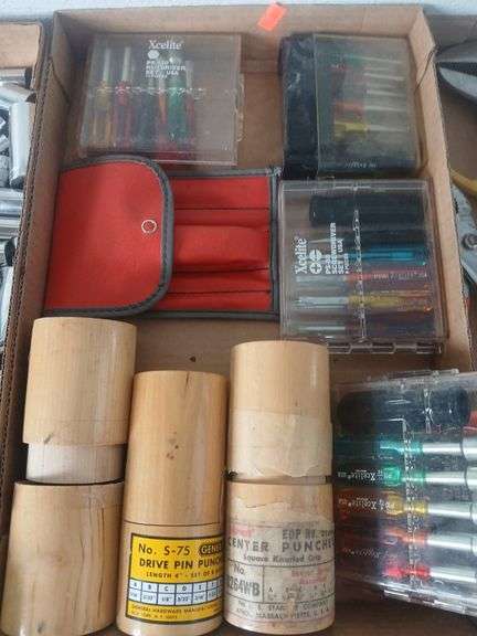 Flat of mini screw driver sets and punch sets. image