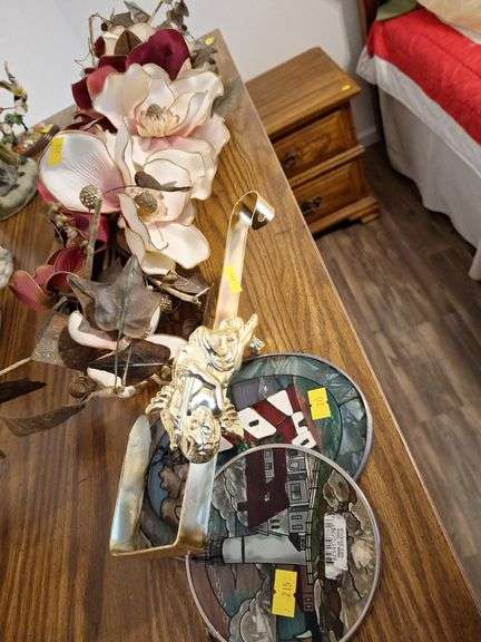 Decorative Flower Arrangement, Glass Lighthouse Ornaments, and Gold-Tone Stocking Holder image
