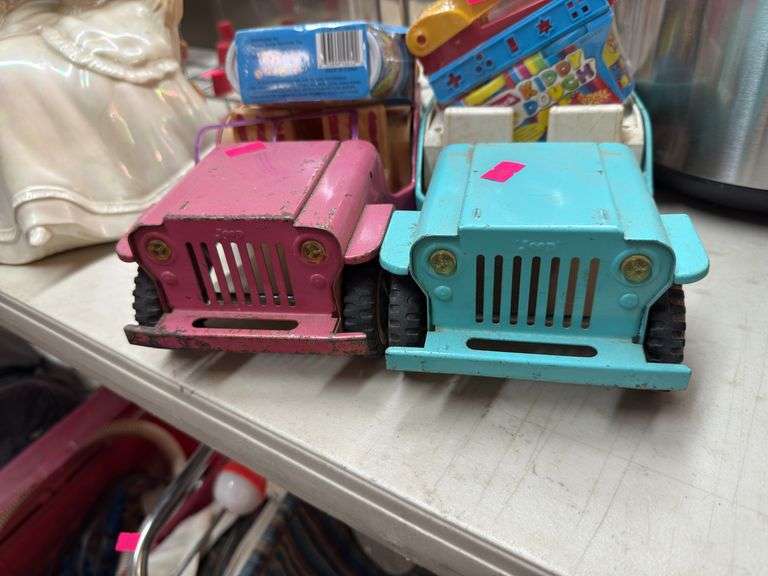 2-Toy jeeps, and 2-kiddy dough sets