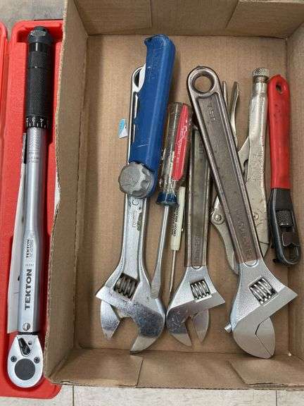 Box of miscellaneous wrenches and tools.