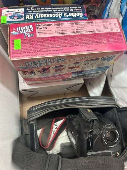 Box Lot: Scene It DVD Game, Heater Meals, Golfer Accessory Kit, and Sharp Video Camera