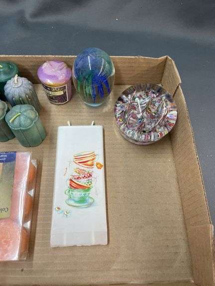 Assorted items: candles, air freshener sprayer, glass items