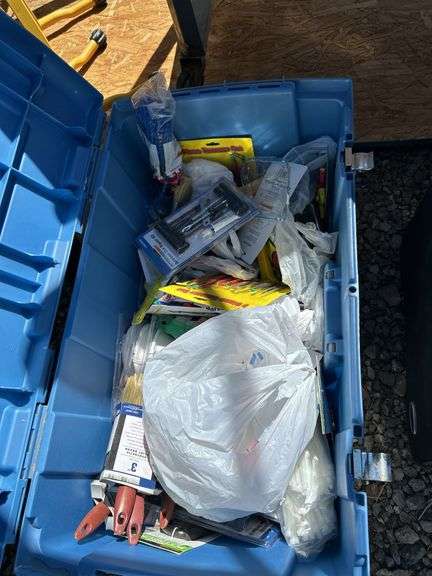 Blue Storage Container with Assorted Supplies