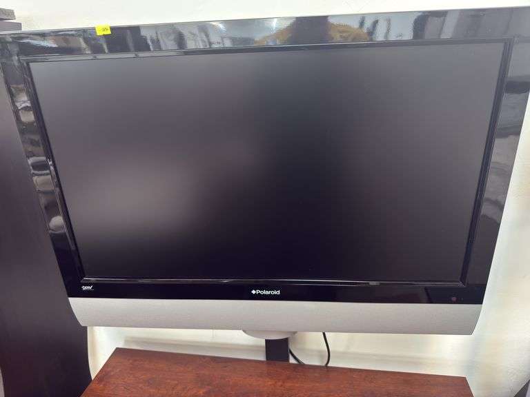 Home entertainment center with Polaroid HDTV