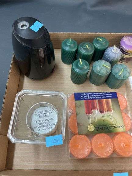 Assorted items: candles, air freshener sprayer, glass items