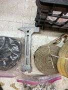 Crate of ratchet straps.