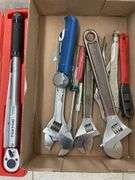 Box of miscellaneous wrenches and tools.