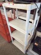2 white plastic shelves