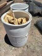 Two White Plastic Storage Barrels
