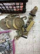 Crate of ratchet straps.