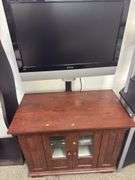 Home entertainment center with Polaroid HDTV