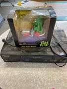 VHS player and Rat Fink bank