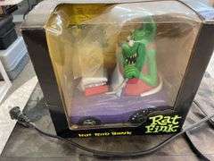 VHS player and Rat Fink bank