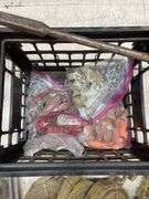 Crate of ratchet straps.