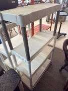 2 white plastic shelves