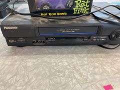 VHS player and Rat Fink bank