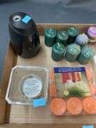 Assorted items: candles, air freshener sprayer, glass items