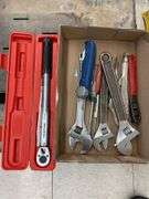 Box of miscellaneous wrenches and tools.