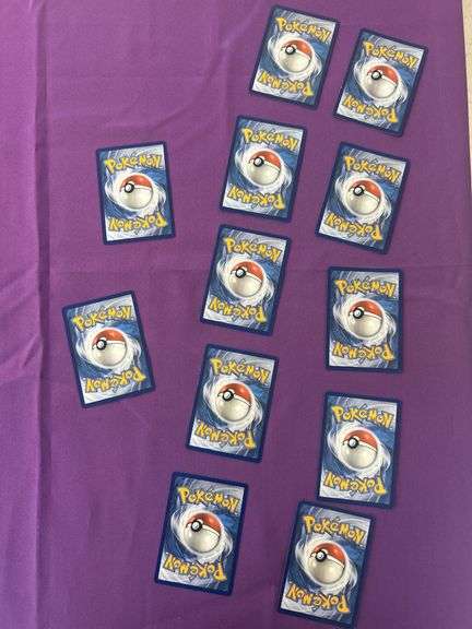 25 Pokémon Cards see pictures