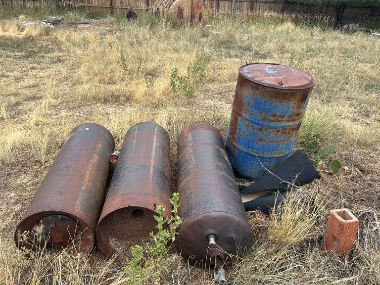 3 hot water heater tanks & 55 gallon Drum image