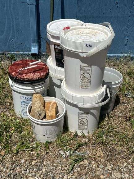 Assorted Buckets with Rocks and Mixed Contents