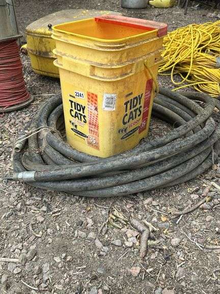 Hydraulic hose, spool of wire, and bucket of miscellaneous image
