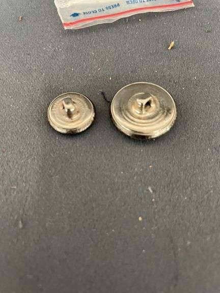 Two Silver-tone Heraldic Buttons