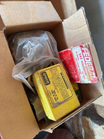 Assorted casings, ammunition box.