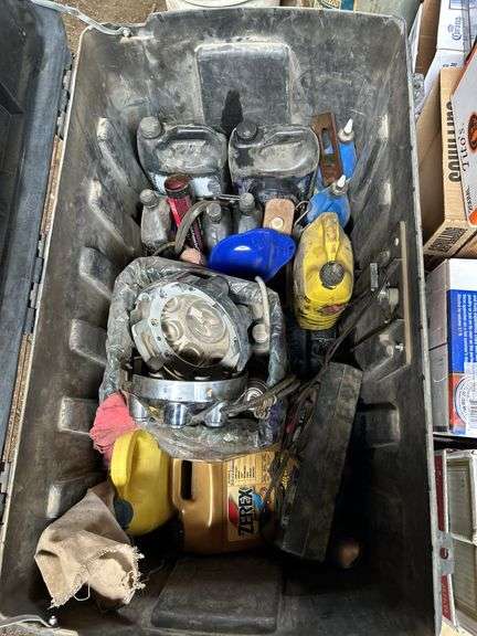 Tough box containing miscellaneous automotive fluids, and tools