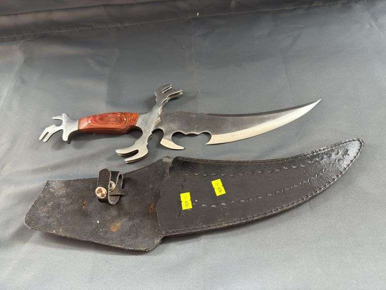 Knife with leather sheath image