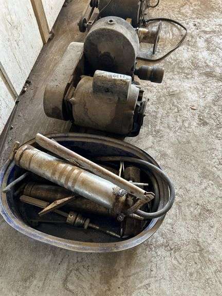 KO Lee spiral grinding fixture and a pan of grease guns and misc tools