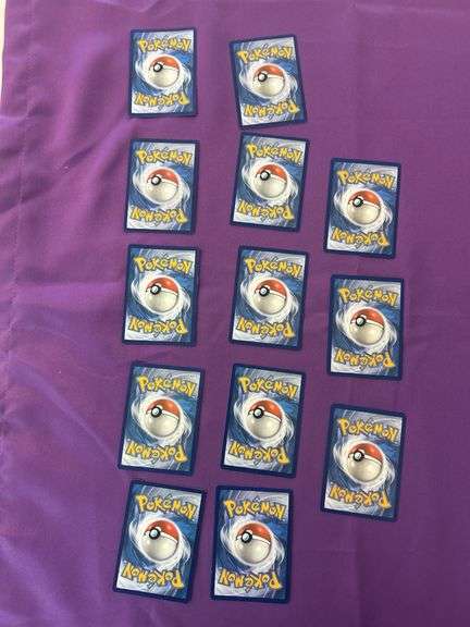25 Pokémon Cards see pictures