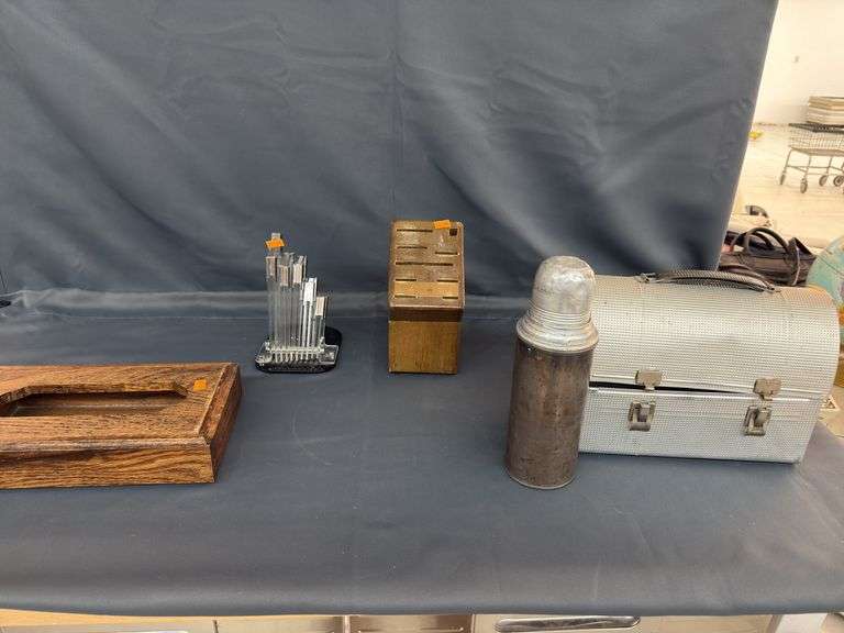Vintage metal lunch box with thermos, tissue dispenser, knife stands image