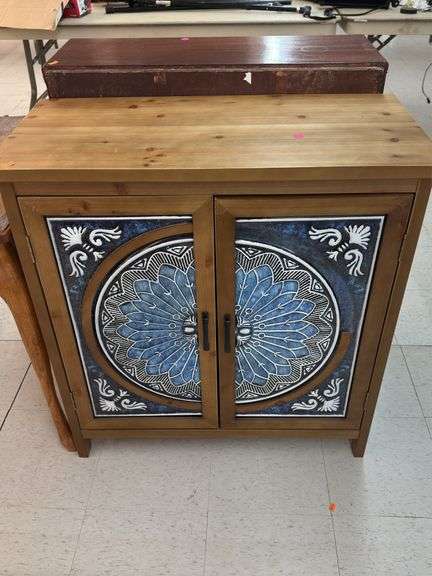 Wood cabinet with painted metal doors image