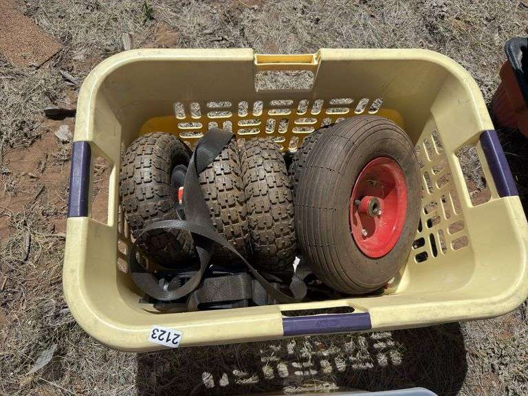 Basket of Wheels and Container of Various Sprays and Containers