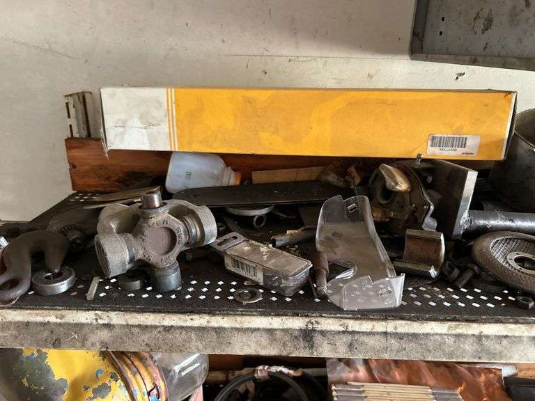Four shelves of miscellaneous hardware and tools