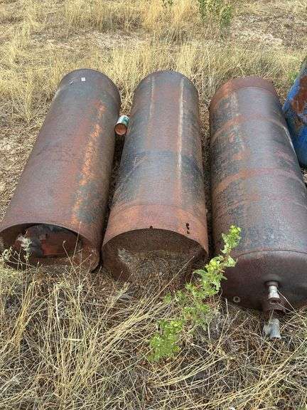 3 hot water heater tanks & 55 gallon Drum