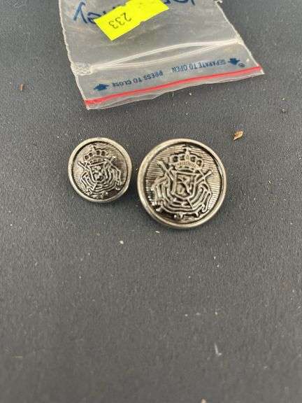 Two Silver-tone Heraldic Buttons