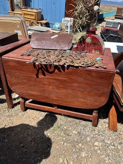 Drop Leaf Table with Decorative Iron Floral Panel and Vase