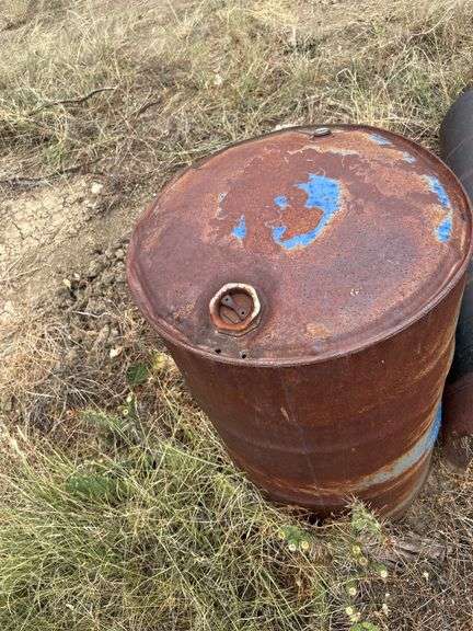 3 hot water heater tanks & 55 gallon Drum