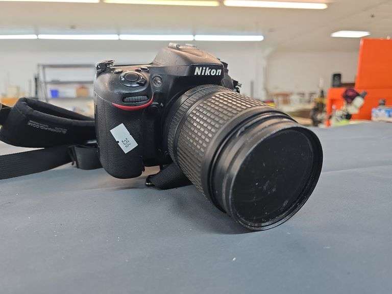 Nikon camera d 7100 with lens image