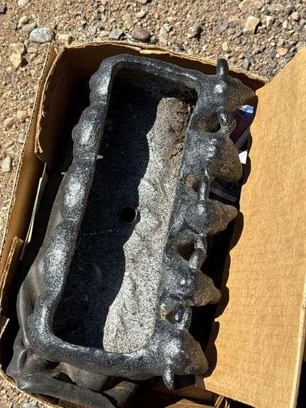 Assorted Estate Finds: Battery Charger, Antler Mount, and Giraffe Planter