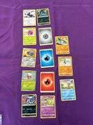 26 Pokémon Cards see pictures