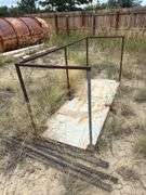Metal door with steel railing welded to it.